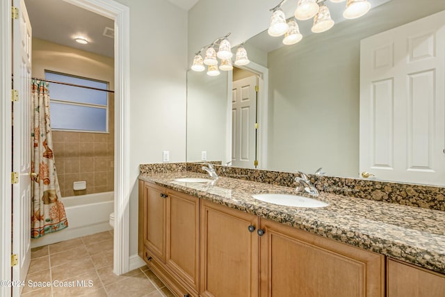 full bathroom featuring tile patterned floors, vanity, toilet, and shower / tub combo