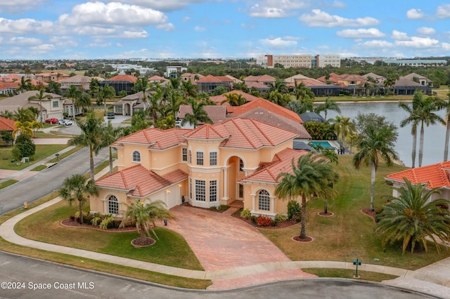 birds eye view of property featuring a water view