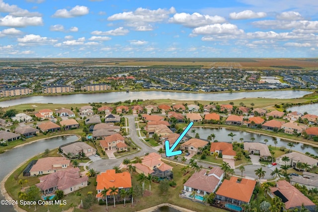 bird's eye view with a water view