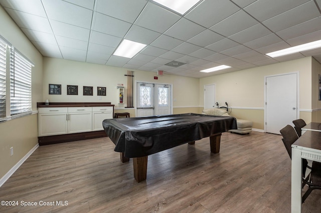 playroom featuring hardwood / wood-style flooring, a paneled ceiling, and billiards