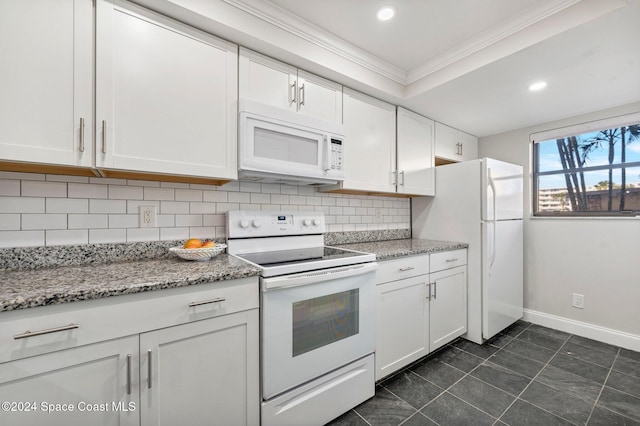 kitchen with decorative backsplash, light stone counters, white appliances, crown molding, and white cabinetry