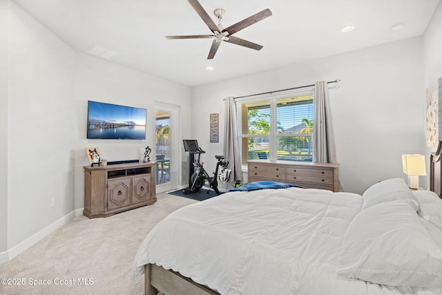 bedroom with light carpet and ceiling fan