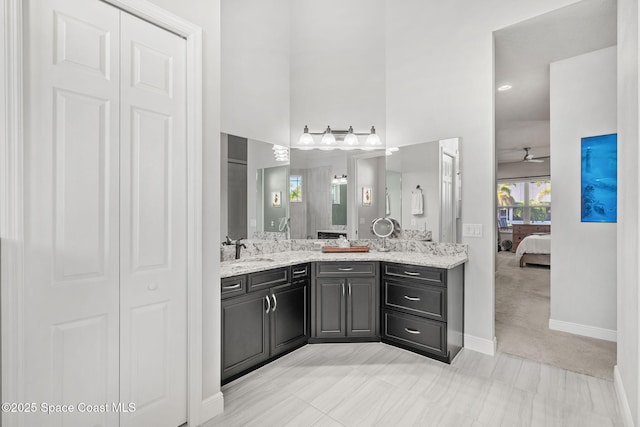 bathroom with vanity and ceiling fan