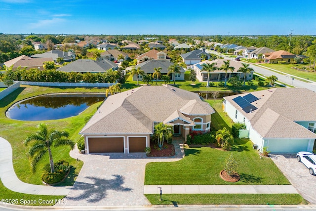 drone / aerial view with a water view