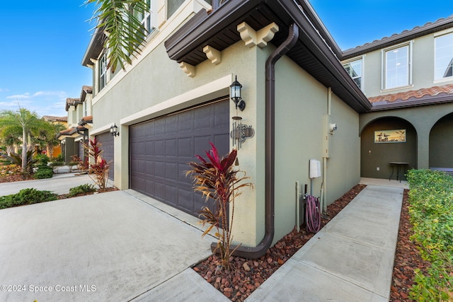 view of home's exterior featuring a garage