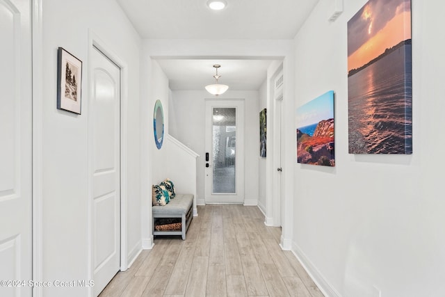 corridor featuring light wood-type flooring