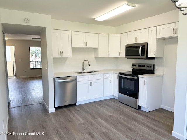 200 International Dr Unit 309, Cape Canaveral, FL 32920 - kitchen featuring appliances with stainless steel finishes, light countertops, and decorative backsplash