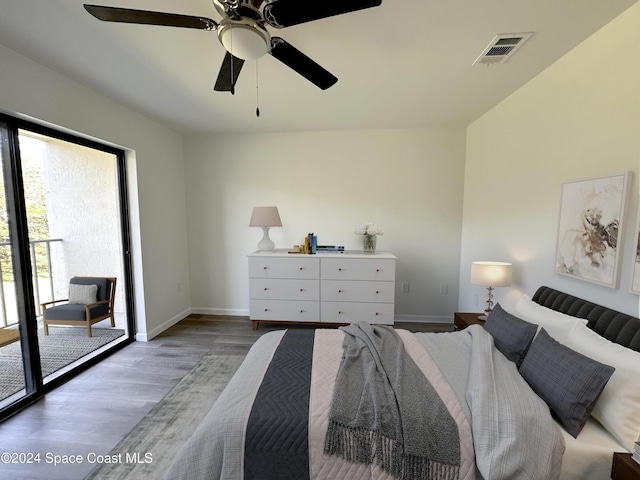 unfurnished bedroom with access to exterior, ceiling fan, and hardwood / wood-style flooring