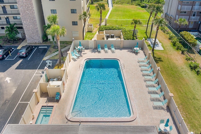 view of swimming pool featuring a patio area