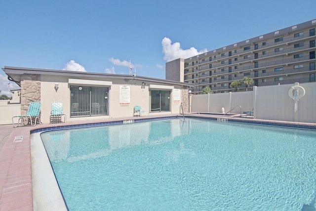 view of pool featuring a patio