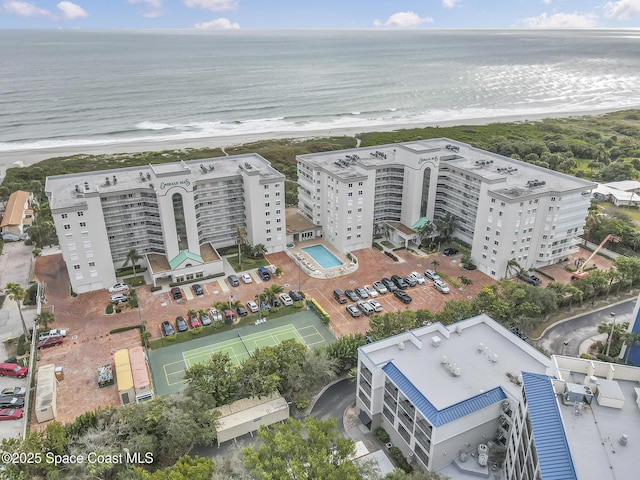 aerial view with a view of the beach and a water view