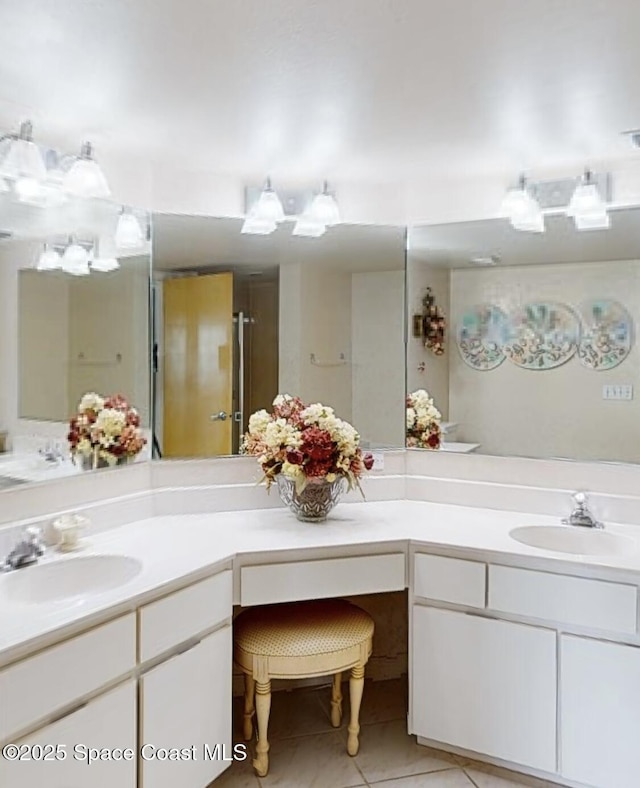 bathroom with vanity and tile patterned floors