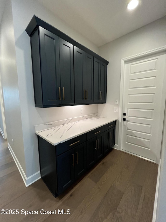 interior space with dark wood-type flooring