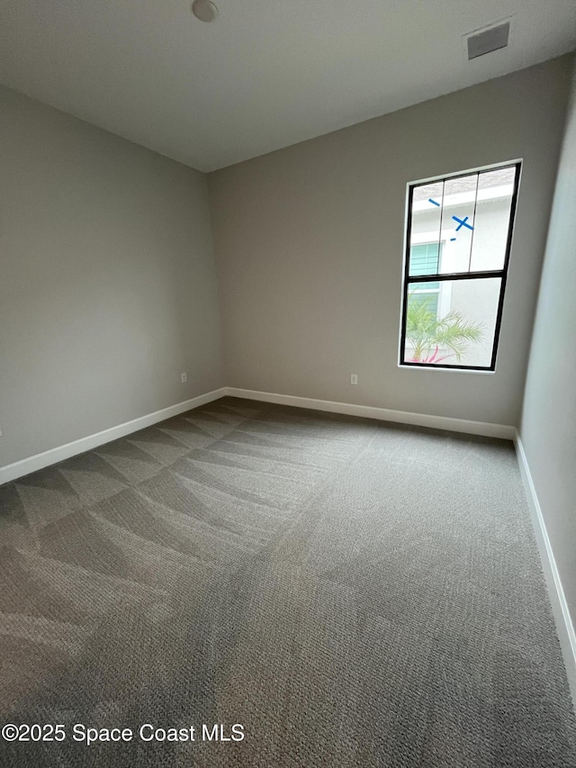 empty room with carpet floors