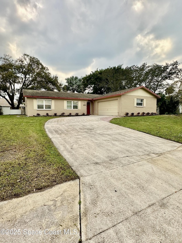 ranch-style house with a front lawn and a garage