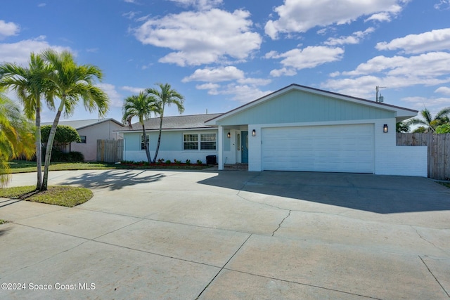 ranch-style home with a garage