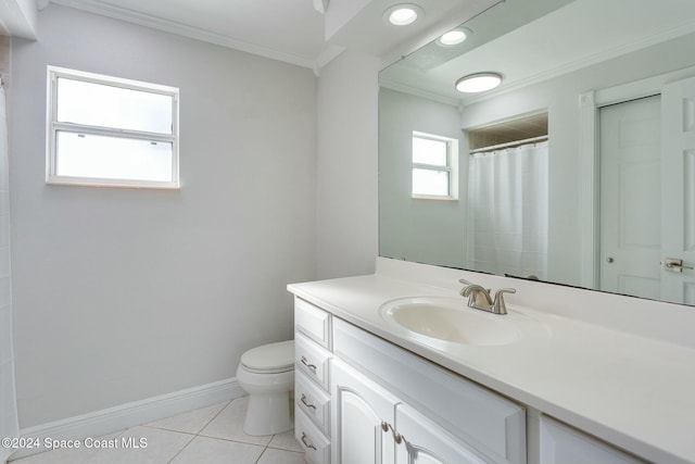 bathroom featuring tile patterned flooring, ornamental molding, toilet, vanity, and a shower with shower curtain