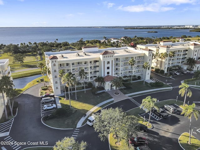 drone / aerial view featuring a water view