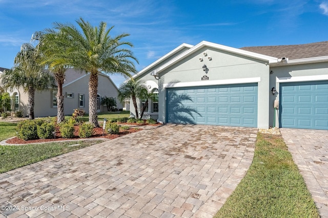 ranch-style home with a garage