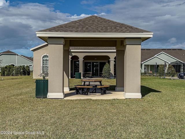 exterior space featuring a gazebo, a yard, and a patio area