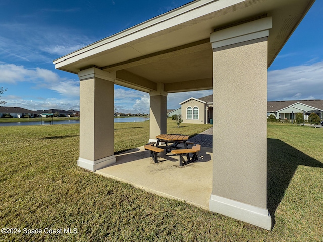 view of patio / terrace with a water view