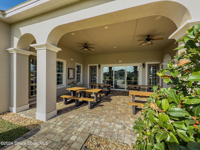 view of patio / terrace featuring ceiling fan