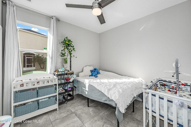 bedroom featuring ceiling fan