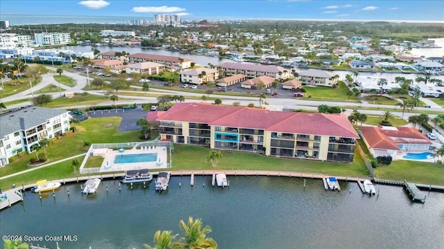 drone / aerial view with a water view