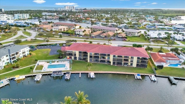 birds eye view of property featuring a water view