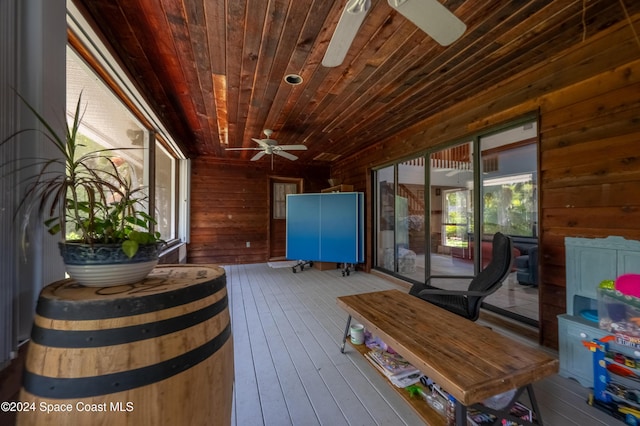 wooden terrace featuring ceiling fan