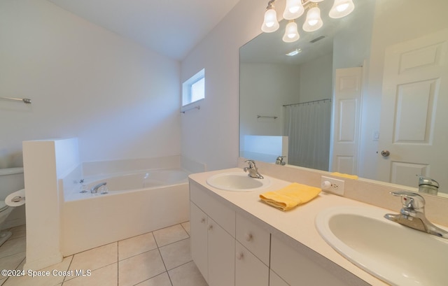 bathroom with a bathing tub, vanity, tile patterned flooring, toilet, and lofted ceiling