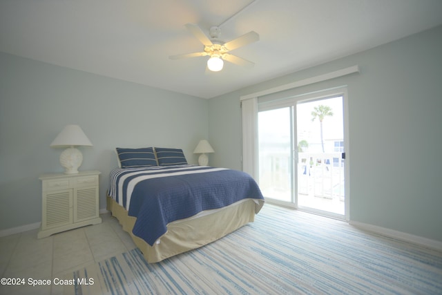 tiled bedroom with access to exterior and ceiling fan