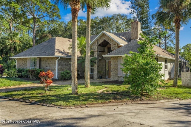 view of front of home with a front yard