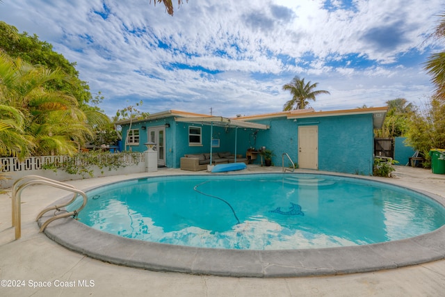 view of pool with a patio