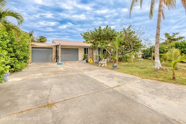 view of front of property featuring a garage