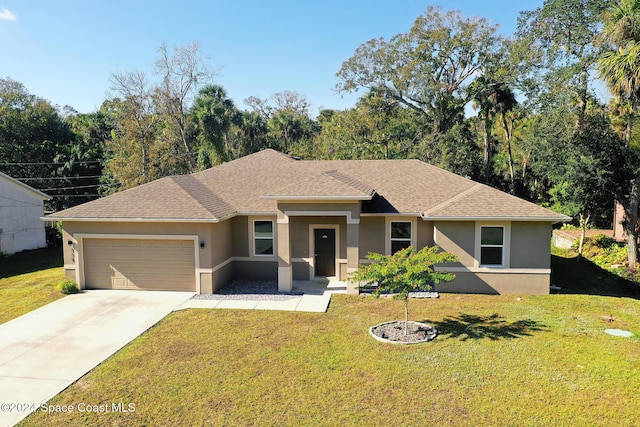 view of front facade with a front lawn and a garage