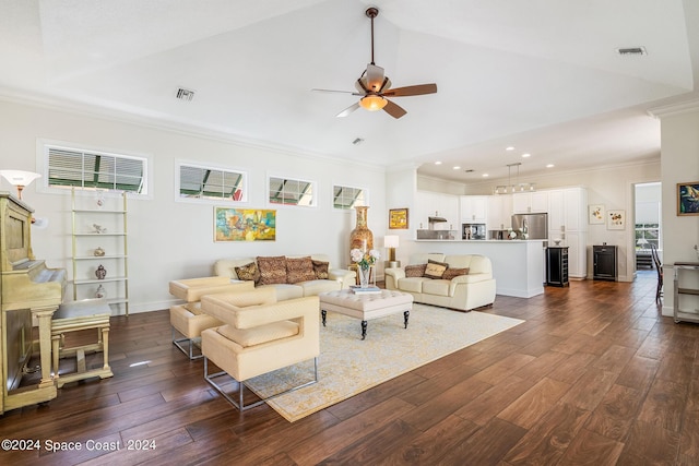 living room featuring dark hardwood / wood-style flooring, ceiling fan, and ornamental molding