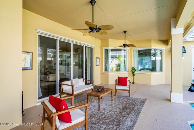 view of patio / terrace featuring ceiling fan