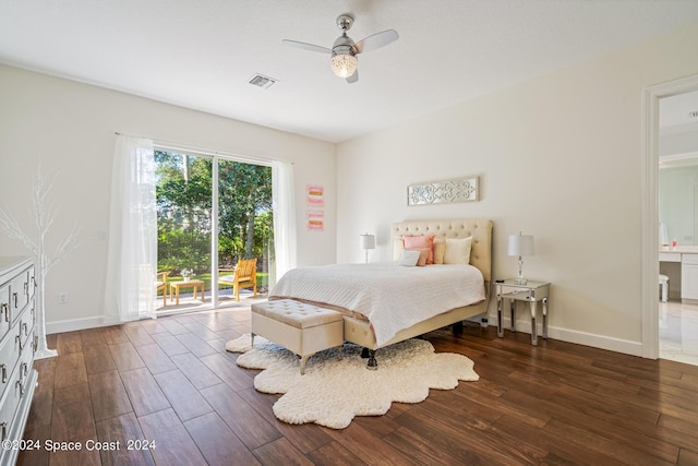 bedroom featuring access to exterior, connected bathroom, ceiling fan, and dark wood-type flooring