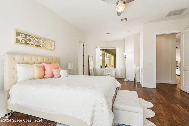 bedroom featuring ceiling fan and dark wood-type flooring