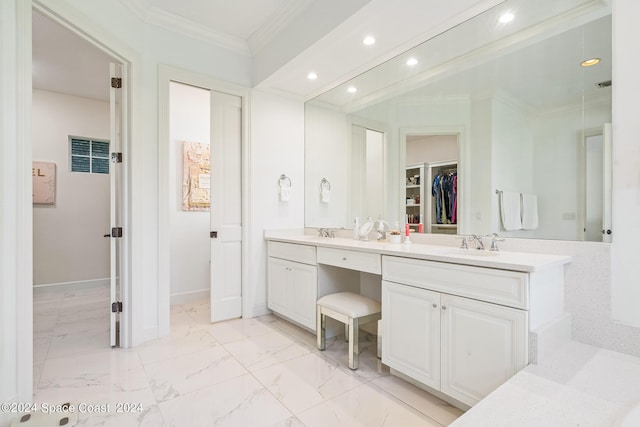 bathroom featuring vanity and ornamental molding