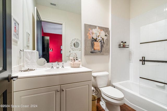 full bathroom with vanity,  shower combination, and toilet