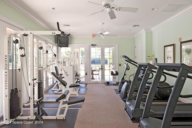 workout area with ceiling fan, french doors, crown molding, and dark colored carpet