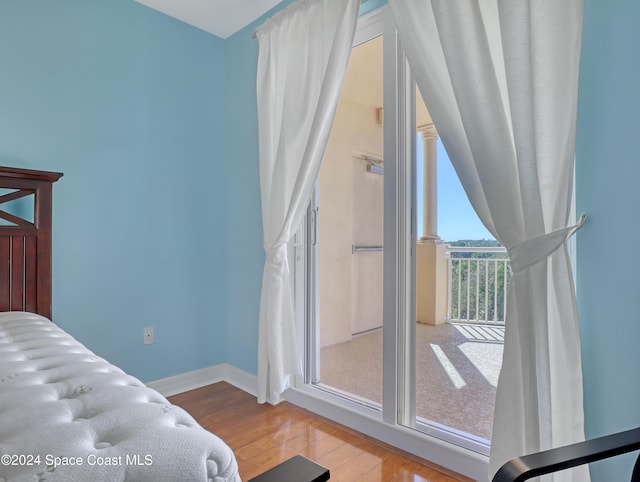 bedroom with light wood-type flooring