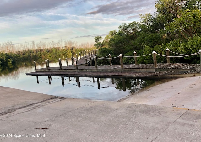 dock area featuring a water view