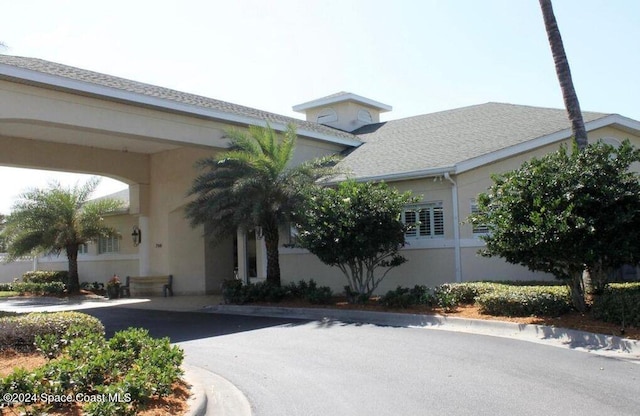 view of front of home featuring a carport