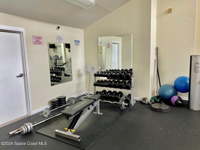 workout room featuring a textured ceiling