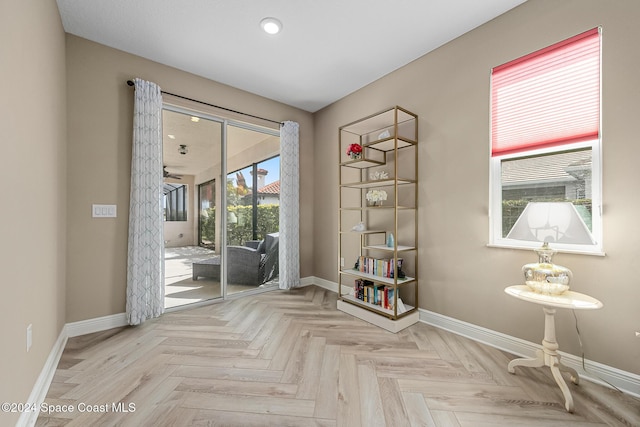 entryway with light parquet floors