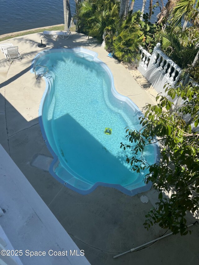 outdoor pool with a patio