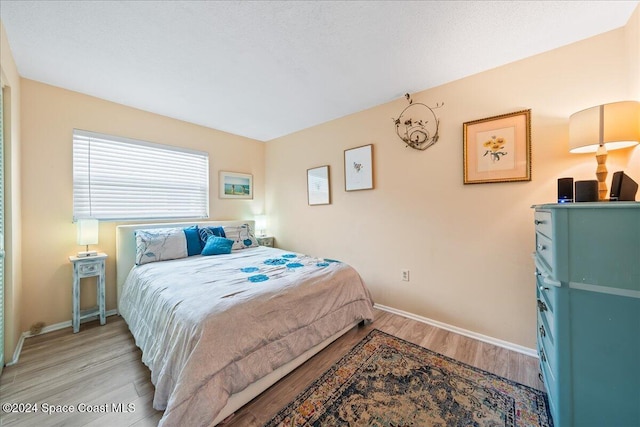 bedroom featuring light hardwood / wood-style flooring